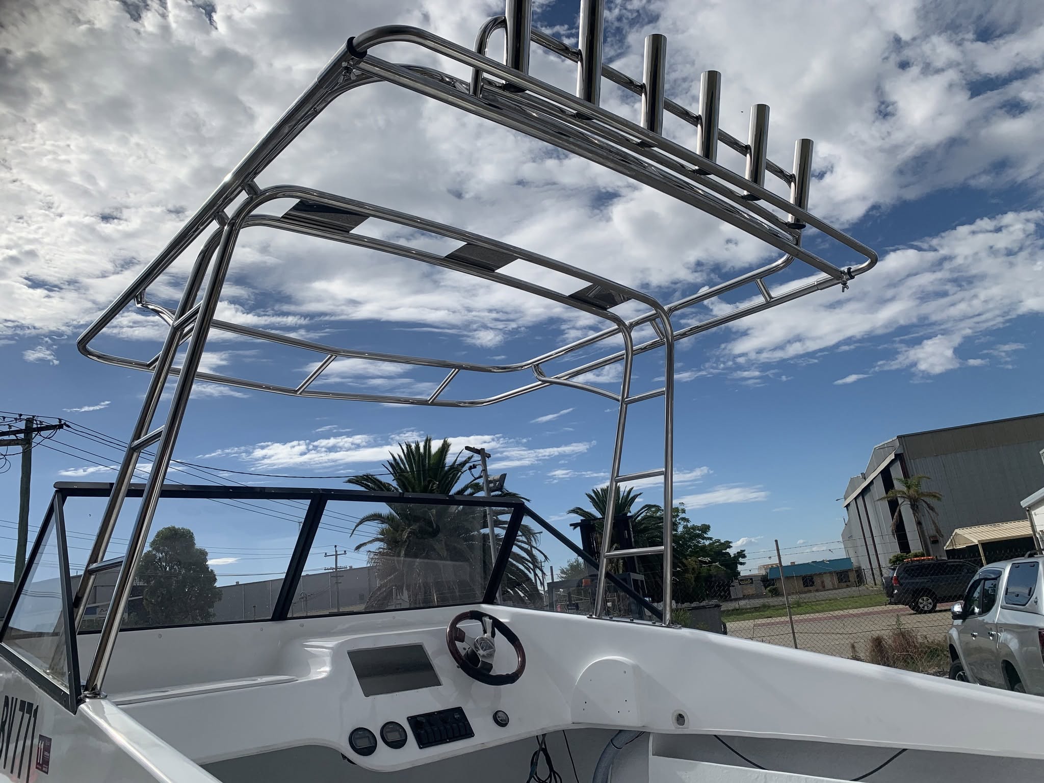 Stainless steel boat canopy frame with overhead rod holders